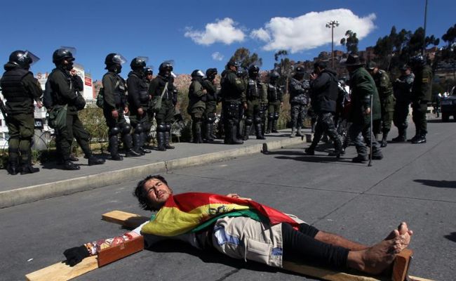 Protester lying on road