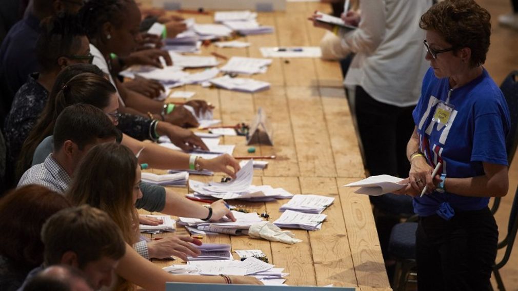 Vote counting staff sort ballot papers at a vote counting centre at The Royal Horticultural Halls in central London on Jun 23, 2016