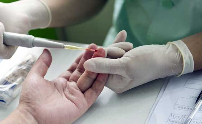 Blood is being taken as sample for blood test