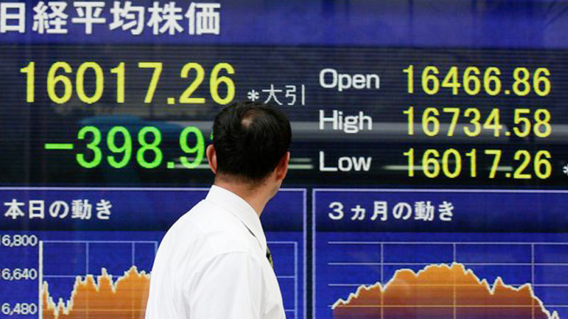 Tokyo shares open lower as strong yen dents exporters
