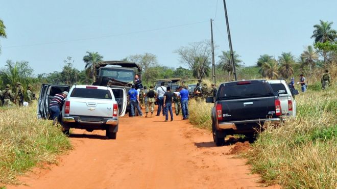Police and soldiers remain on the site where eight Paraguayan soldiers were killed in the morning