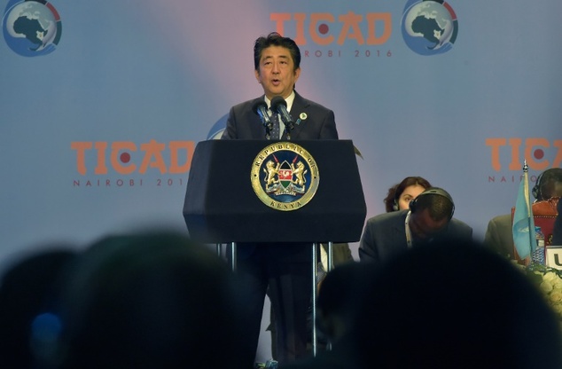 Japanese Prime Minister Shinzo Abe delivers a speech during the opening of the TICAD