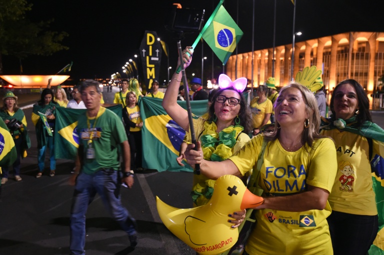 Opponents of Brazilian President Dilma Rousseff rally in front of the National Congress in Brasilia