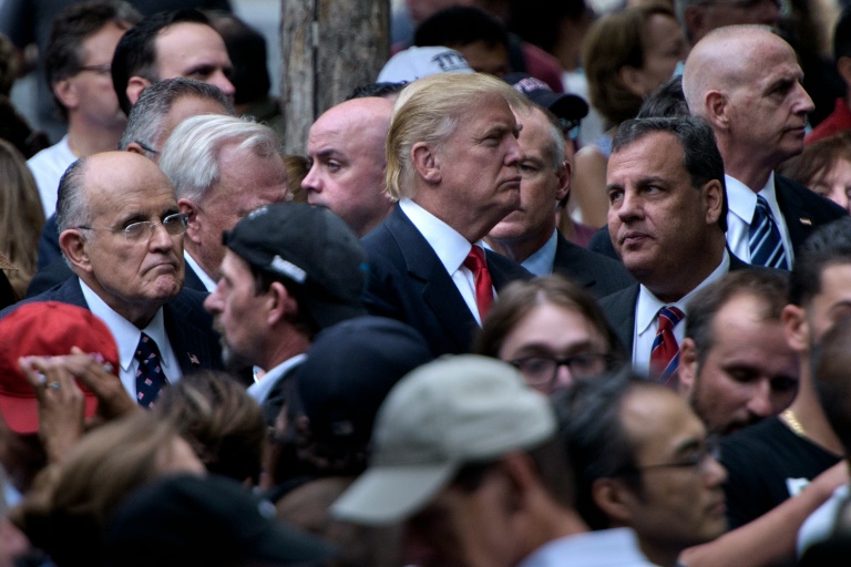 Former New York City Mayor Rudy Giuliani, Republican presidential nominee Donald Trump and New Jersey Governor Chris Christie stand together at the National 9/11 Memorial 