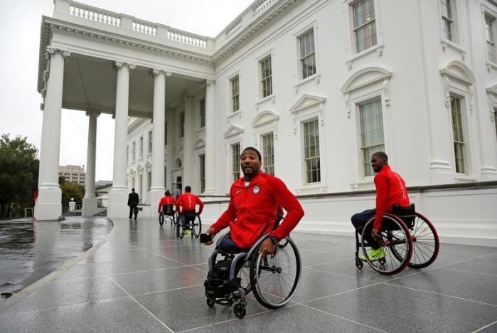 Members of U.S. Paralympics team arrive to be greeted by President Barack Obama at the White House in Washington, U.S., September 29, 2016. REUTERS/Yuri Gripas