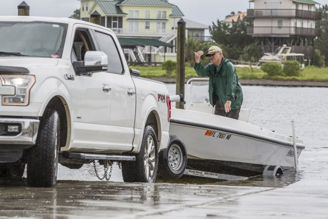 Dale Barstow pulls his boat from the water ahead of tropical storm Hermine on August 31, 2016 in the Shell Point community near Saint Marks, Florida