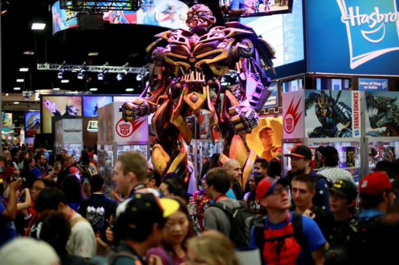 A Transformers statue stands on display at the Hasbro booth during the 2014 Comic-Con International Convention in San Diego, California