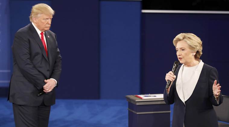 Democratic US presidential nominee Hillary Clinton and Republican US presidential nominee Donald Trump during their presidential town hall debate at Washington University in St. Louis, Missouri, US, October 9, 2016