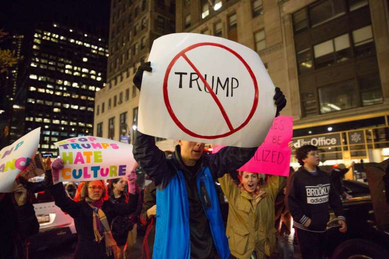 Protesters take to the streets following an anti-Trump demonstration in front of Trump Tower in Manhattan, New York