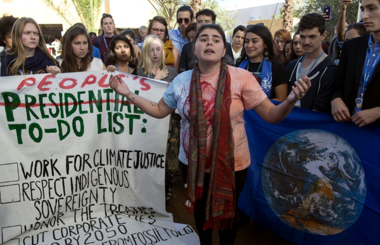 American students protest outside the UN climate talks during the COP22 international climate conference in Marrakesh