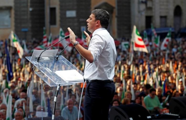 Italian Prime Minister Matteo Renzi speaks during a rally in downtown Rome, Italy