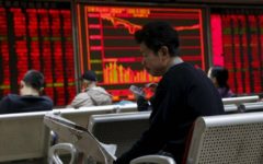 Asian markets piled higher following a surge on Wall Street