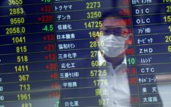 Asian stocks rose on Wednesday to build on another strong performance in New York