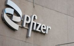 Pfizer sharply scaled back its earnings outlook for the year