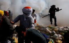 Police fire tear gas at protesting Indian farmers