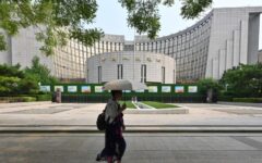 China’s central bank said it had cut two key interest rates to historic lows