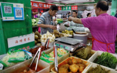 China narrowly avoided slipping into deflation in December with inflation rising at its slowest pace in nine months