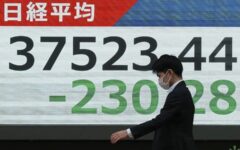 Asian equities sank and Treasuries remained under pressure following sharp losses on Wall Street