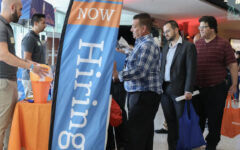 US hiring slows less than expected; unemployment unchanged