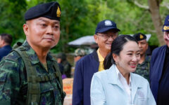 Embattled Thai PM reshuffles cabinet as crisis rages