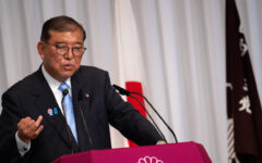Japan PM hangs on after election debacle