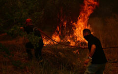 Thousands battle Greece fires as heatwave bakes Europe