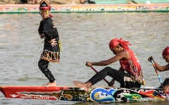 Indonesian child’s viral fame draws tourists to boat race