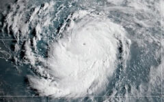 Hurricane Erin intensifies offshore, lashes Caribbean with rain