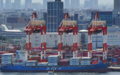 Japan posts modest growth despite US tariffs