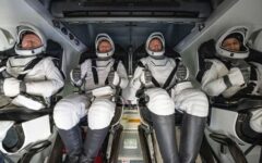 Five astronauts began their descent back down to Earth on a SpaceX capsule