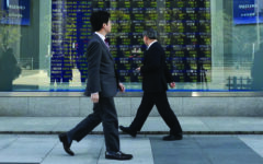 Most Asian markets rise as traders await key US data