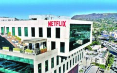 Mixed day for global stocks as market digest huge Netflix deal