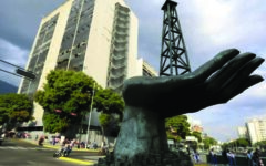 Tech firms lead Asian markets higher, oil swings after Maduro ouster